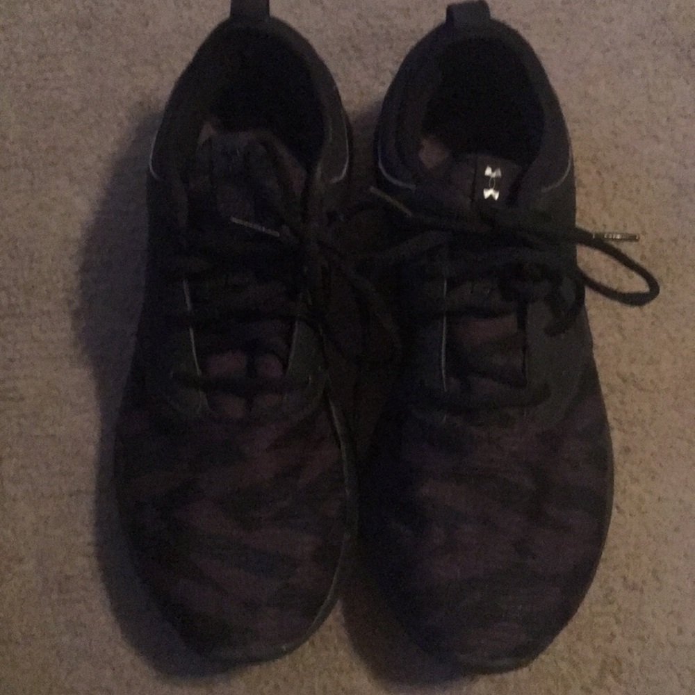 Under Armour  bulk and grey running shoes